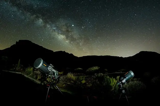 Telescopes under the Milky Way on Mount Teide during a Tenerife sunset and star gazing tour